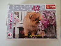Trefl Dog with flowers - obrázek puzzlí