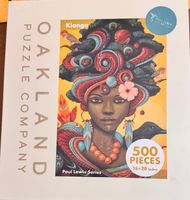 Oakland Puzzle Company Kianga - obrázek puzzlí