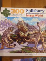 Spilsbury Puzzle Co Snow leopard family - puzzle image
