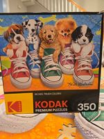 Kodak Sneaky Pups - obrázek puzzlí