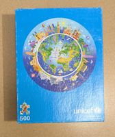 Unicef round jigsaw puzzle - puzzle image