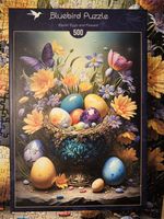 Bluebird Easter eggs and flowers - puzzle image