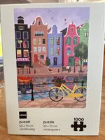Hema Amsterdam by the river - puzzle image