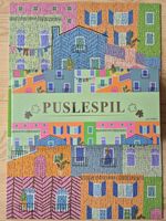 Nohro Puslespil - farverige bygninger - obrázek puzzlí