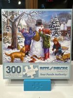 Bits and Pieces Building a Snowman on a Snow Day - obrázek puzzlí