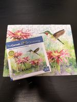 New York Puzzle Company Ruby-throated Hummingbird - puzzle image