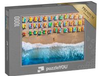 puzzleYOU Frau am Strand mit bunten Liegestühlen, Türkei - puzzle image