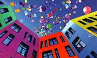 Puzzlebug Balloons Over Colourful Buildings - puzzle image