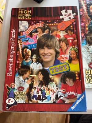 Ravensburger HSM1 Superstar Troy - obrázek puzzlí
