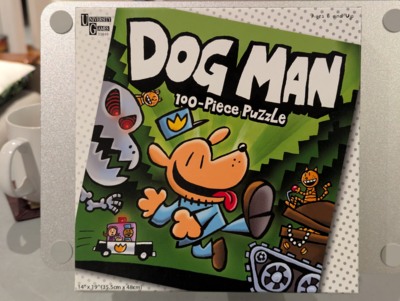 University Games Dog Man Unleashed - obrázek puzzlí