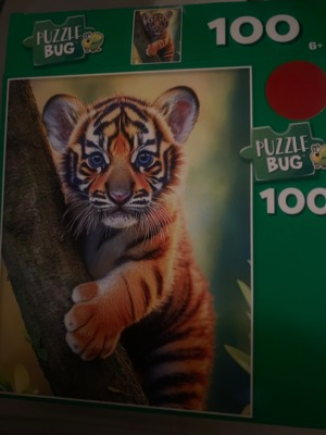 Puzzlebug Tiger Cub in Tree - puzzle image