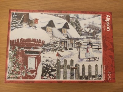 Alipson Robin in snow - パズル画像