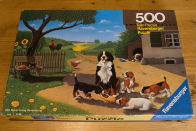Ravensburger Dogs Playing - imagen del puzzle