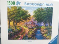 Ravensburger Cottage by the river - puzzle image
