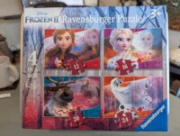 Ravensburger Moments in Time - obrázek puzzlí