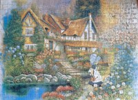 Unknown Niña regando su jardín - obrázek puzzlí